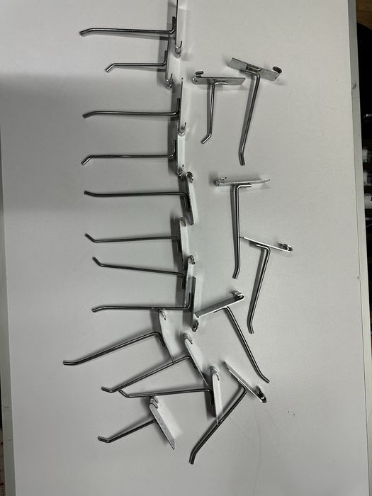 Suportes para ranhura de prateleiras