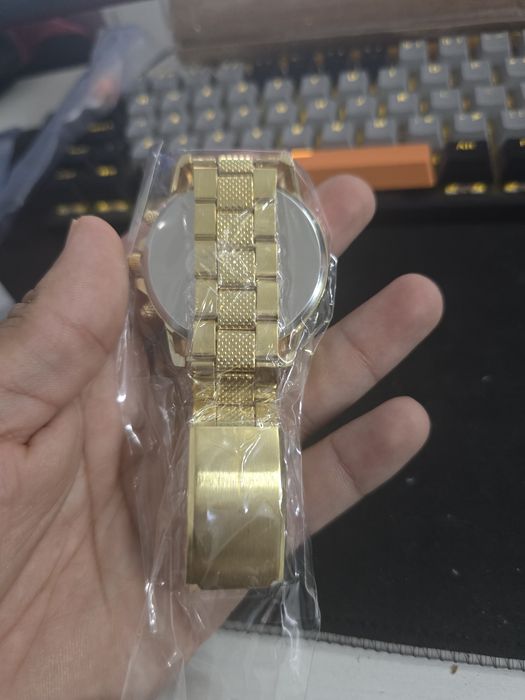 Relógio unissexo Geneva dourado e azul
