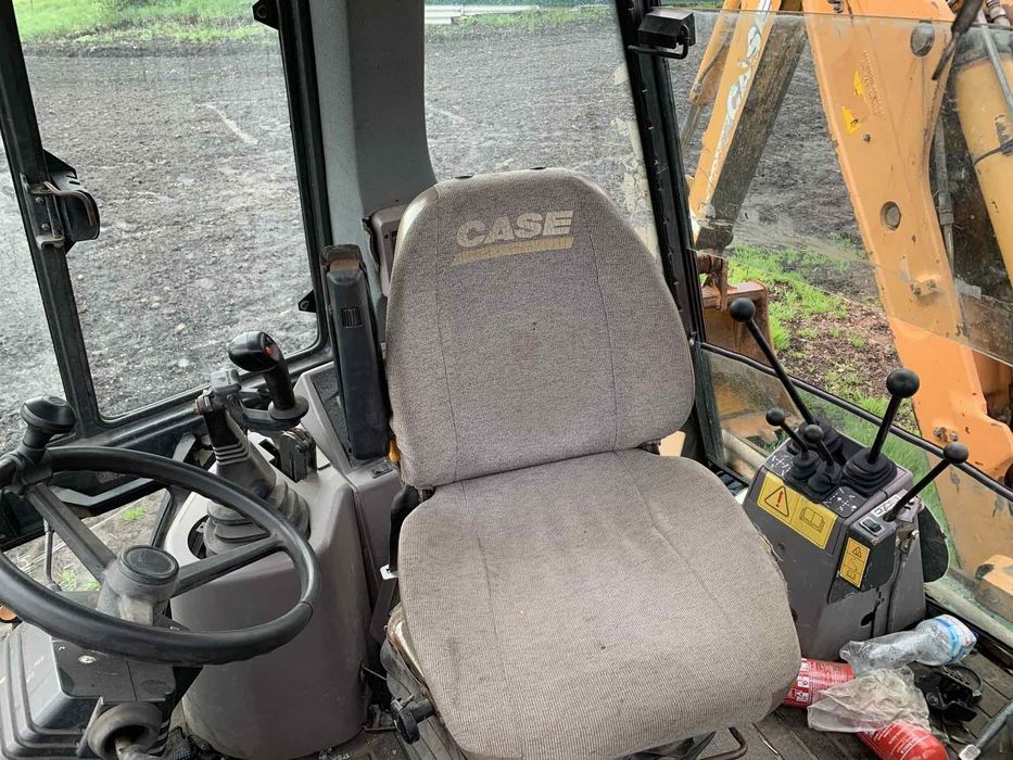 Case 580SM екскаватор навантажувач