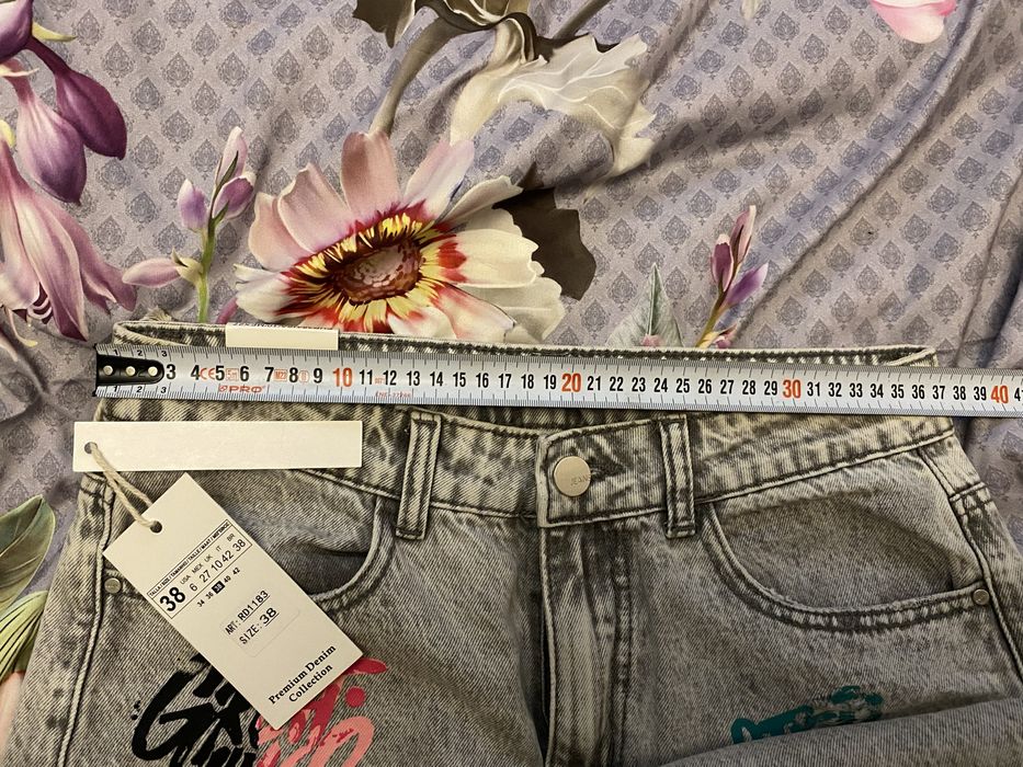 Super spodnie jeans przetarcia Nowe Graffiti rozmiar 38