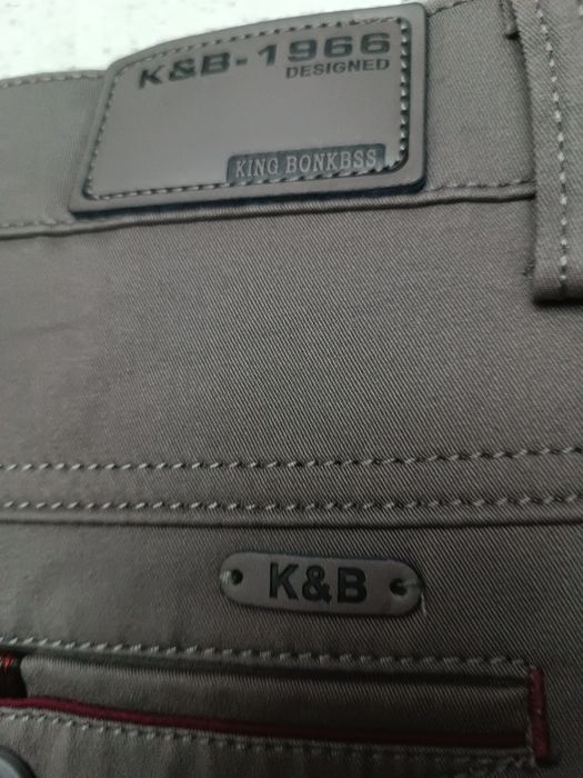 Spodnie nowe męskie Chinosy Eleganckie  W47  L32
