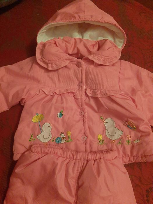 Дитячі, зимові комбінезони.