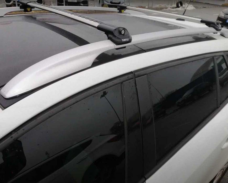 Поперечини Turtle AIR1 на високі рейлінги багажник