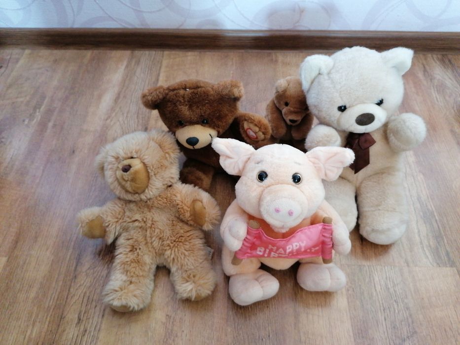 Продам детские игрушки (игрушка на коляску,юла, мягкие игрушки)