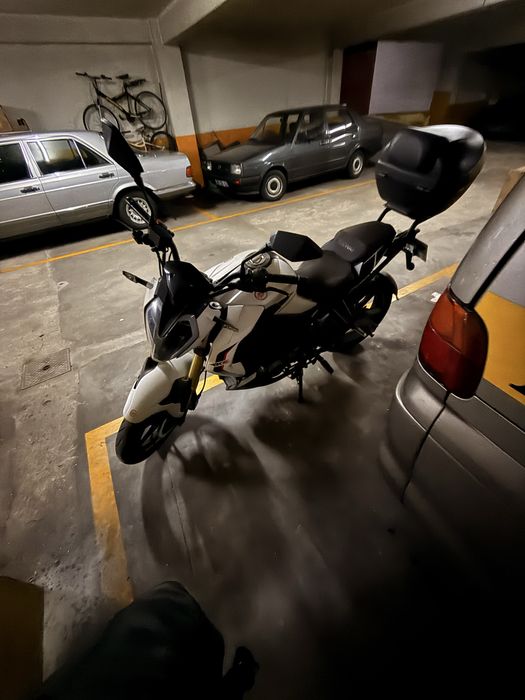 Mota poucos km em perfeito estado