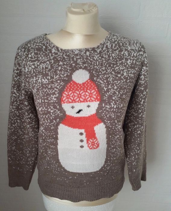 Uroczy damski sweterek