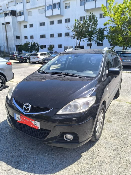 Mazda 5,  monovolume, 7 lugares, diesel.