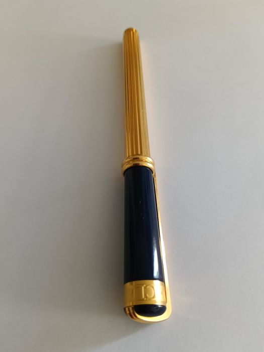 Vendo caneta Christian dior ouro