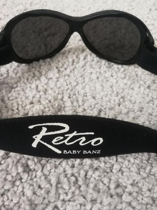 Dziecięce okulary słoneczne z filtrem UV pasek czarne Baby banz