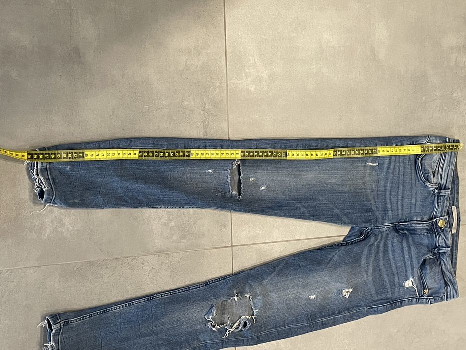 Spodnie jeansy z rozdarciami damskie Zara