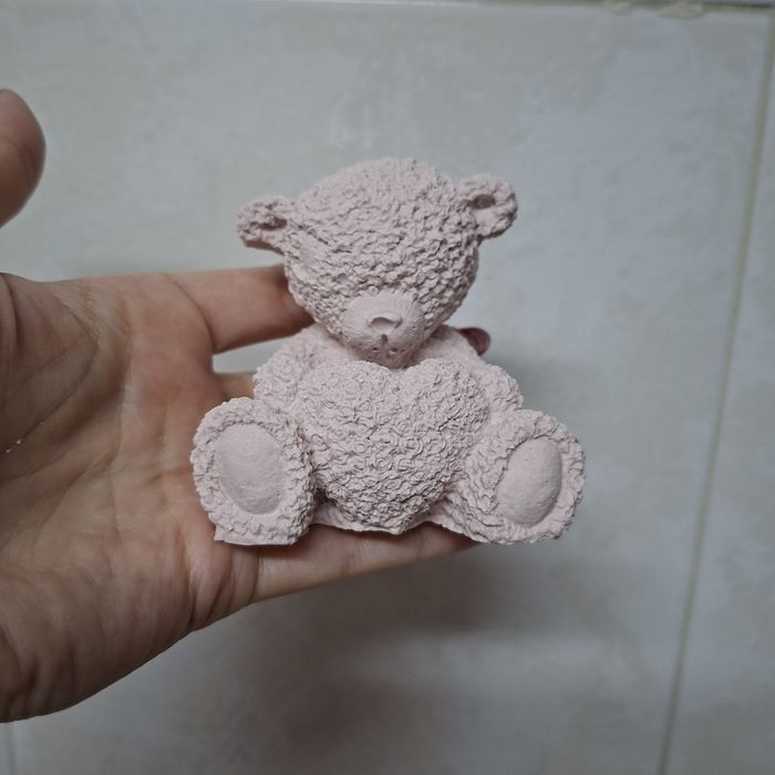 Peças em gesso e velas com cera de soja aromáticas