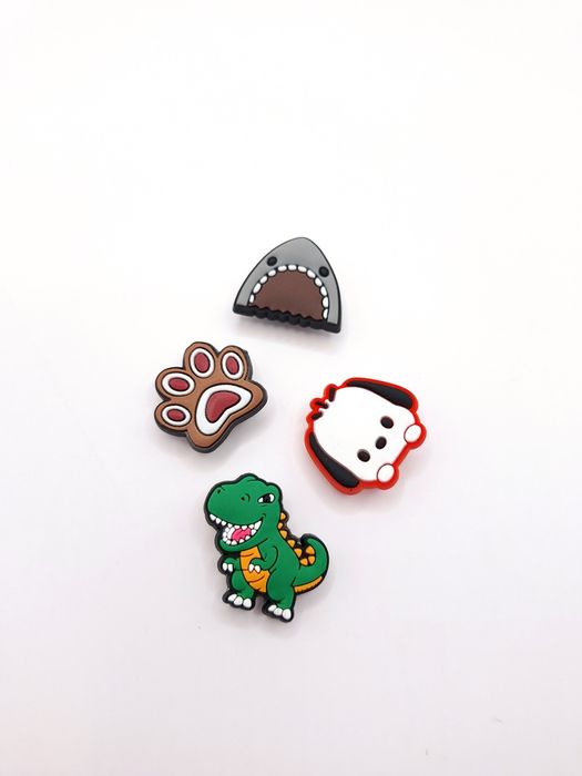 Zestaw przypinek do Crocs 4 szt przypinki charmsy do crocsów dinozaur