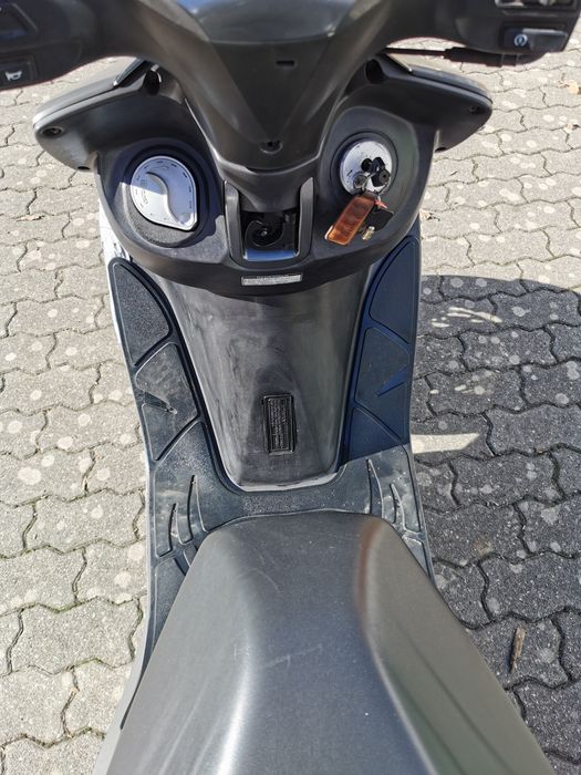 Sym vs 125  DE GARAGEM