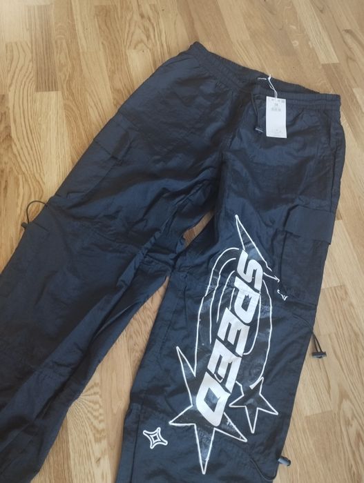 Nowe spodnie ortalionowe cargo Cropp