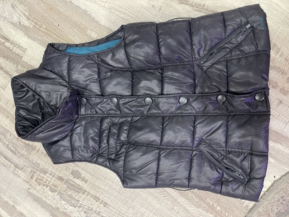 Жіноча жилетка тепла