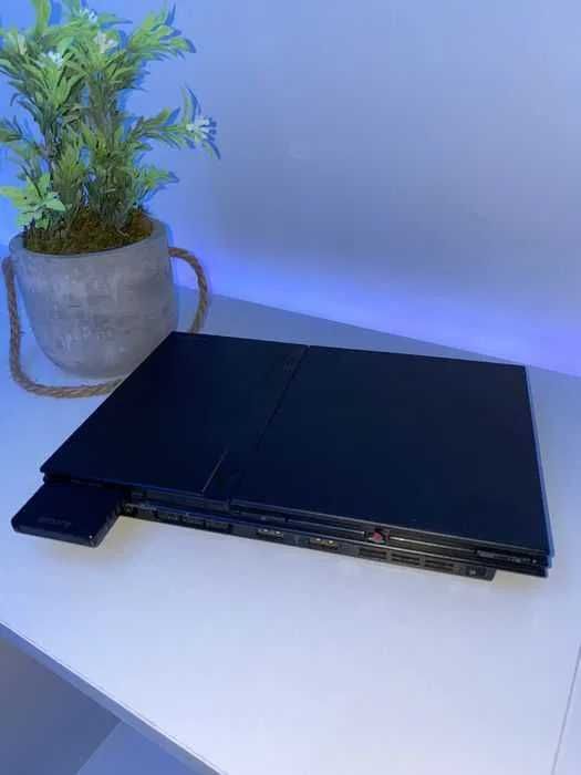 Vendo playstation 2 com 2 comandos originais