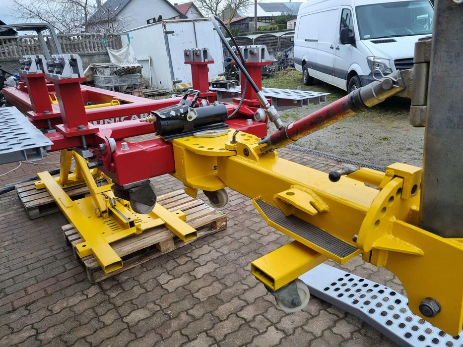 UNICAR TRZY docery  rama plyta blacharska podnosnik nozycowy stan bdb