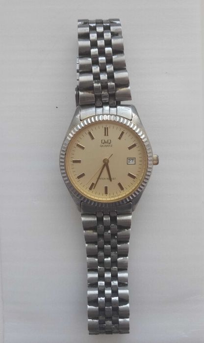 Часы q&q quartz water resist .