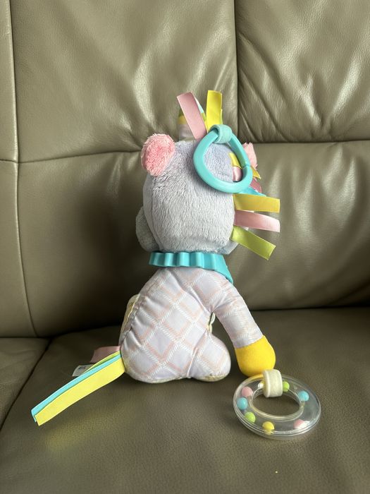 Skip Hop Сенсорна підвіска Єдиноріг з прорізувачем на коляску