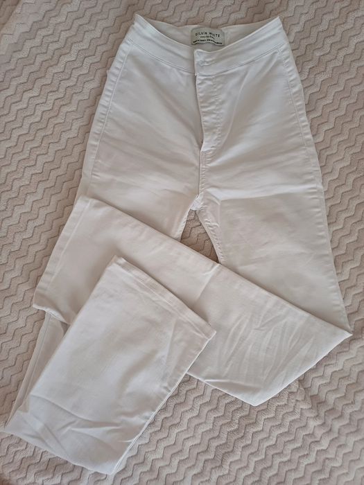 Штани білі кльош