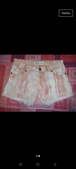 Calções de adulto e vestido de criança