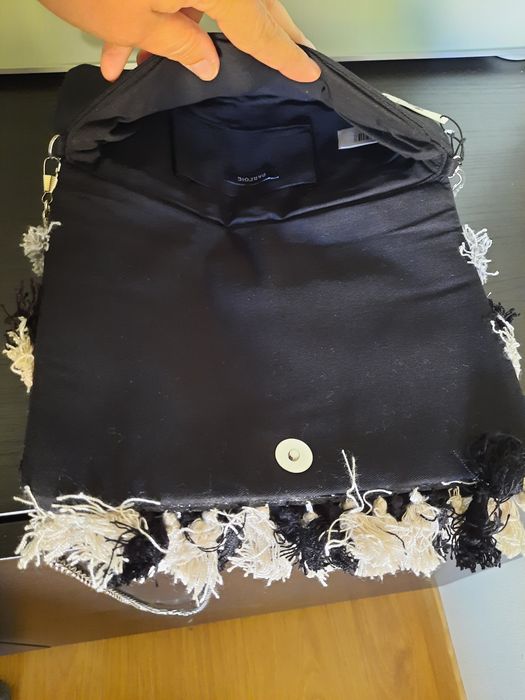 Mala à tiracolo parfois