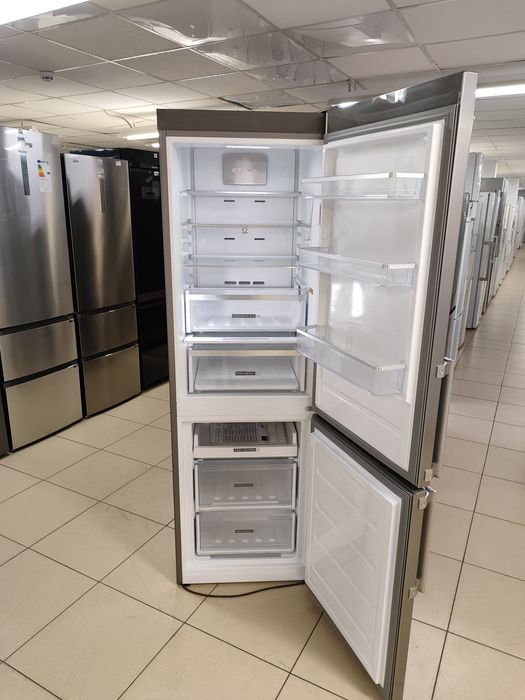 Холодильник з системою охолодження No Frost Whirlpool W9821DOXH