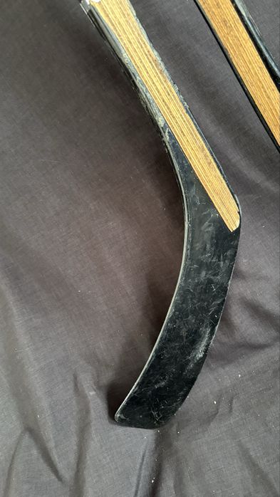 2 sticks de hochey de patins em linha