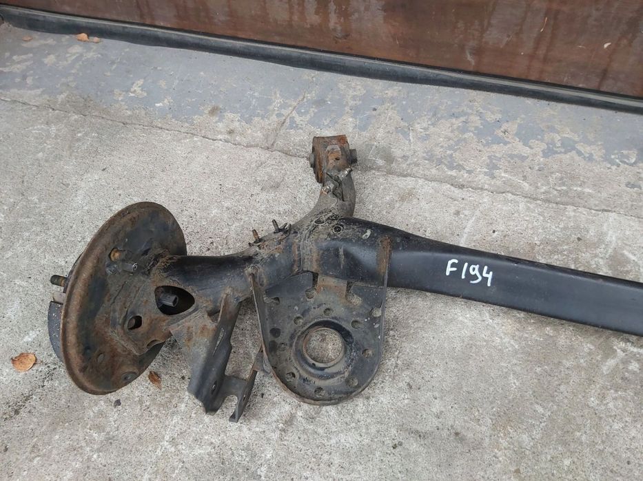 Toyota Yaris II III belka zawieszenia tył bębny ŁADNA