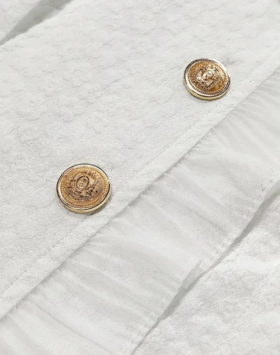 Блузка біленька..