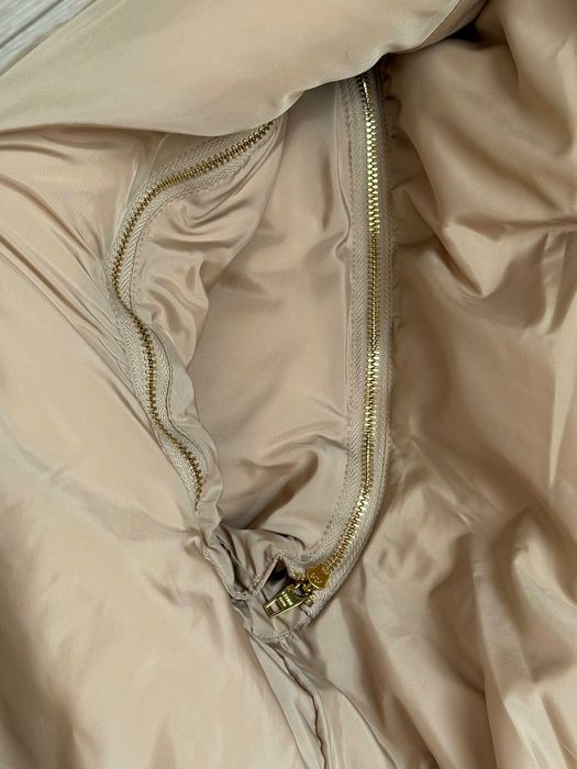 Жіноча пухова куртка