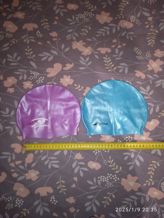 Шапочки для плавання нові