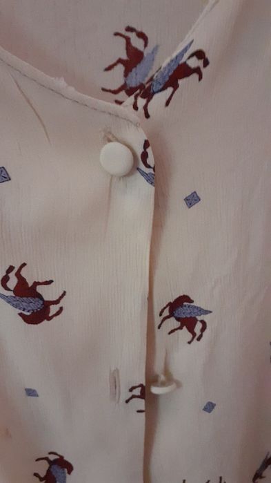 2 € Blusa XL de manga curta, botões forrados, tecido fresco