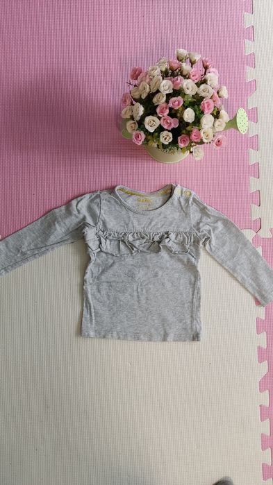 Bluzka z falbankami i długim rękawem 80