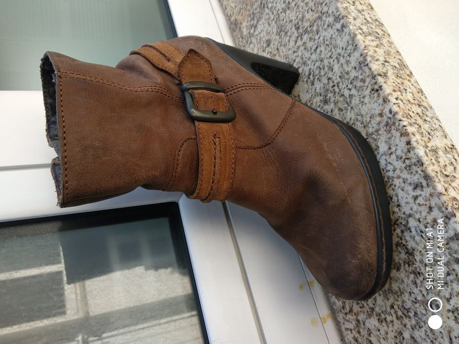 Botas tacão em pele