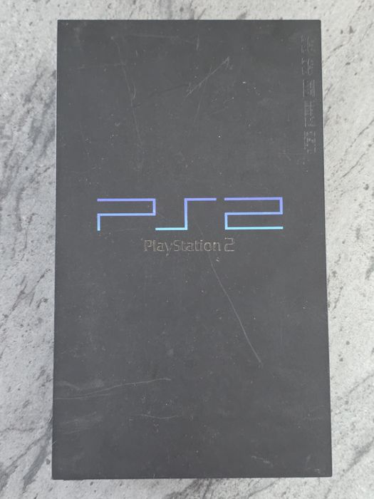 Playstation 2 + modchip + 3 gry