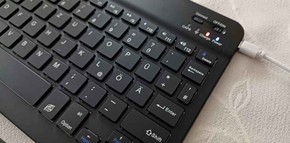 Клавіатура бездротова для  планшета , смартфону.