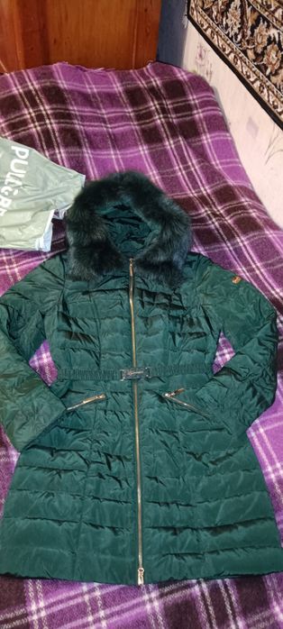 Продам женский пуховик