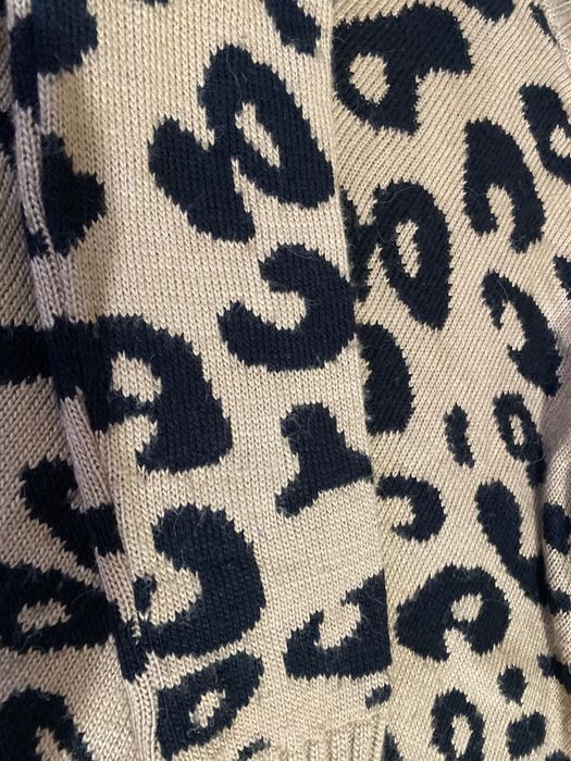 Жіноча тепла кофта в леопардовий принт