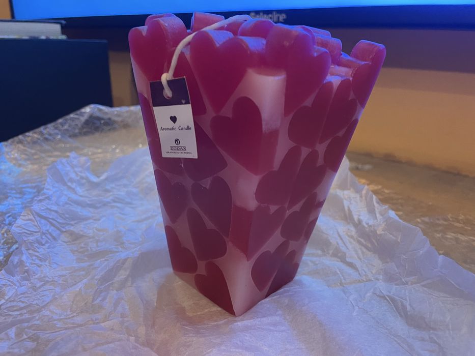 Velas novas pergumadas com  corações muito bonitas