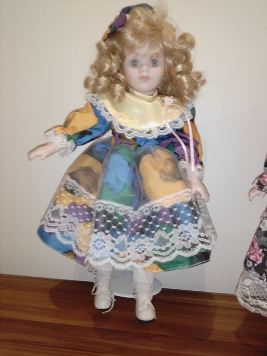 Bonecas de porcelana estão novas  como se vê nas fotos