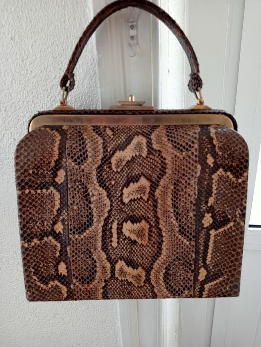 Mala de pele de cobra verdadeira