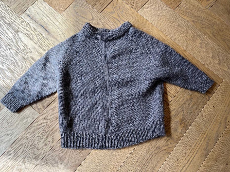 Wełniany sweterek 104