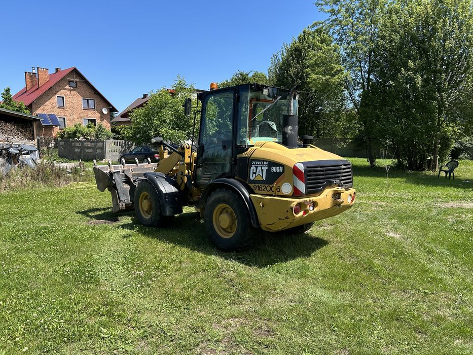 Caterpillar CAT 906H ładowarka z Niemiec + widły
