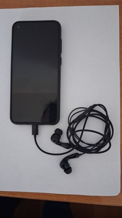 Sprzedam telefon Samsung m11 używany +słuchawki przewodowe nowe