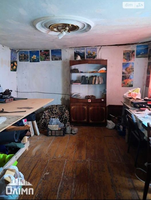 Продам пів будинку в топовом місці на вул.Кармелюка 0962