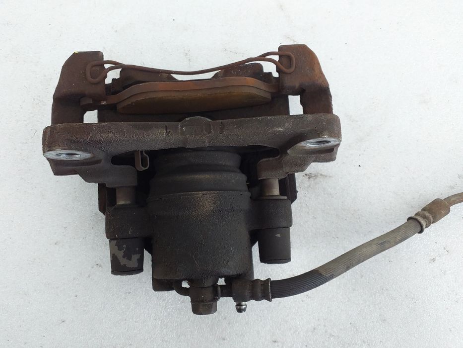 Pinça travão / maxila de travão frente esquerda TOYOTA Auris Hatchback