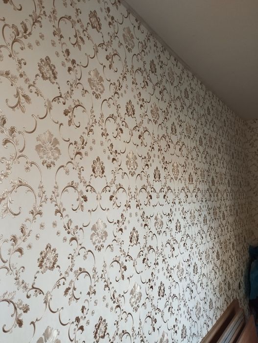 Поклейка шпалер ,