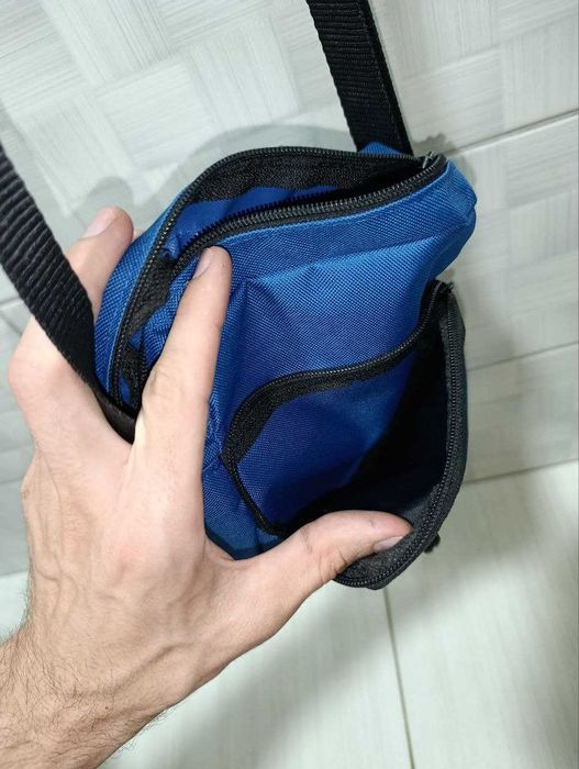 синяя сумка через плечо Nike Elemental.