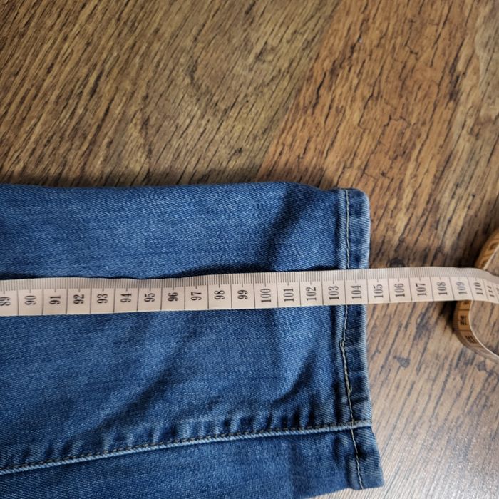 Granatowe spodnie męskie niebieskie jeansy proste Levis XS 34